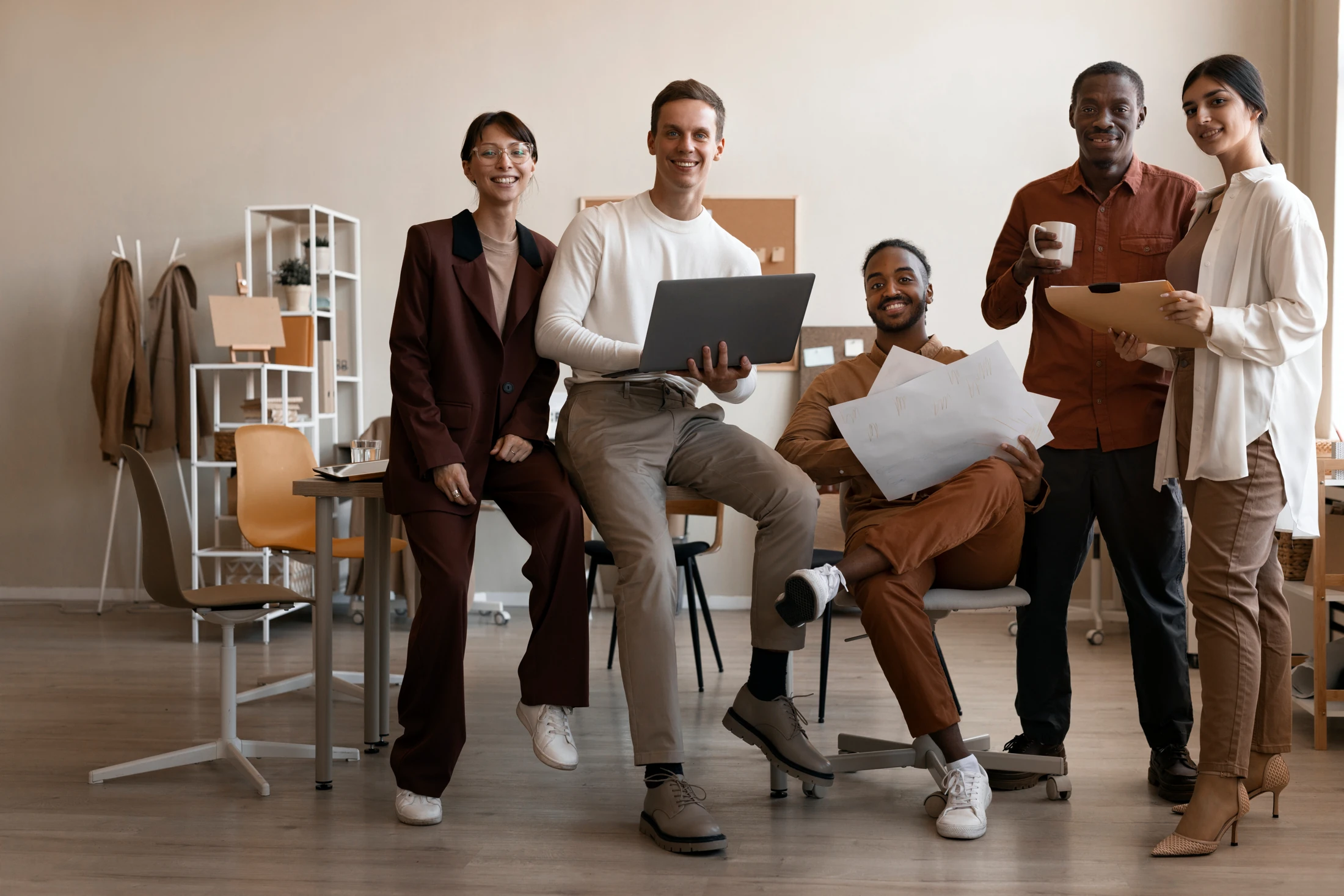 The creative team gathered in their studio